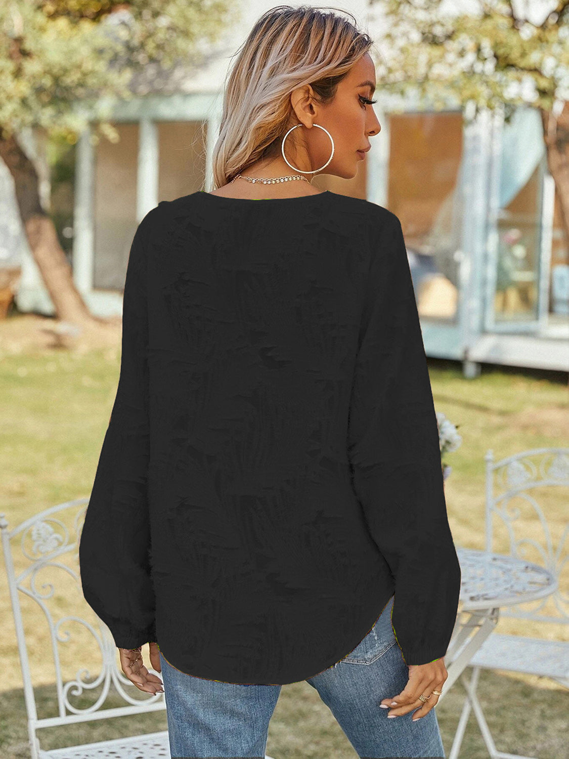 Blusa de manga larga con cuello en V