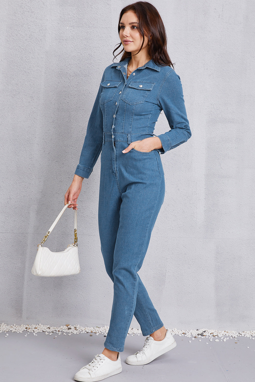 Jeans-Jumpsuit mit Druckknöpfen und Taschen