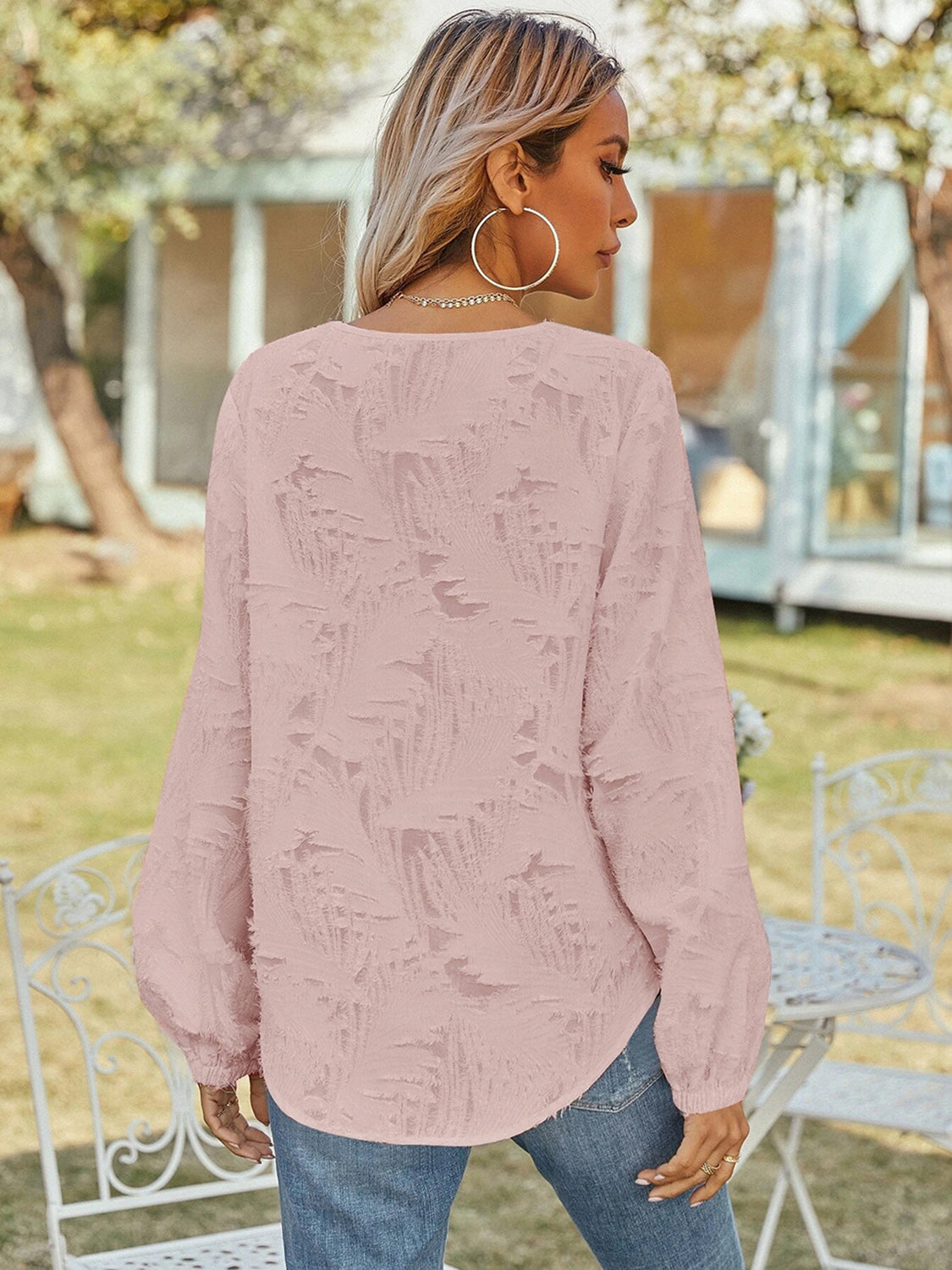 Blusa de manga larga con cuello en V