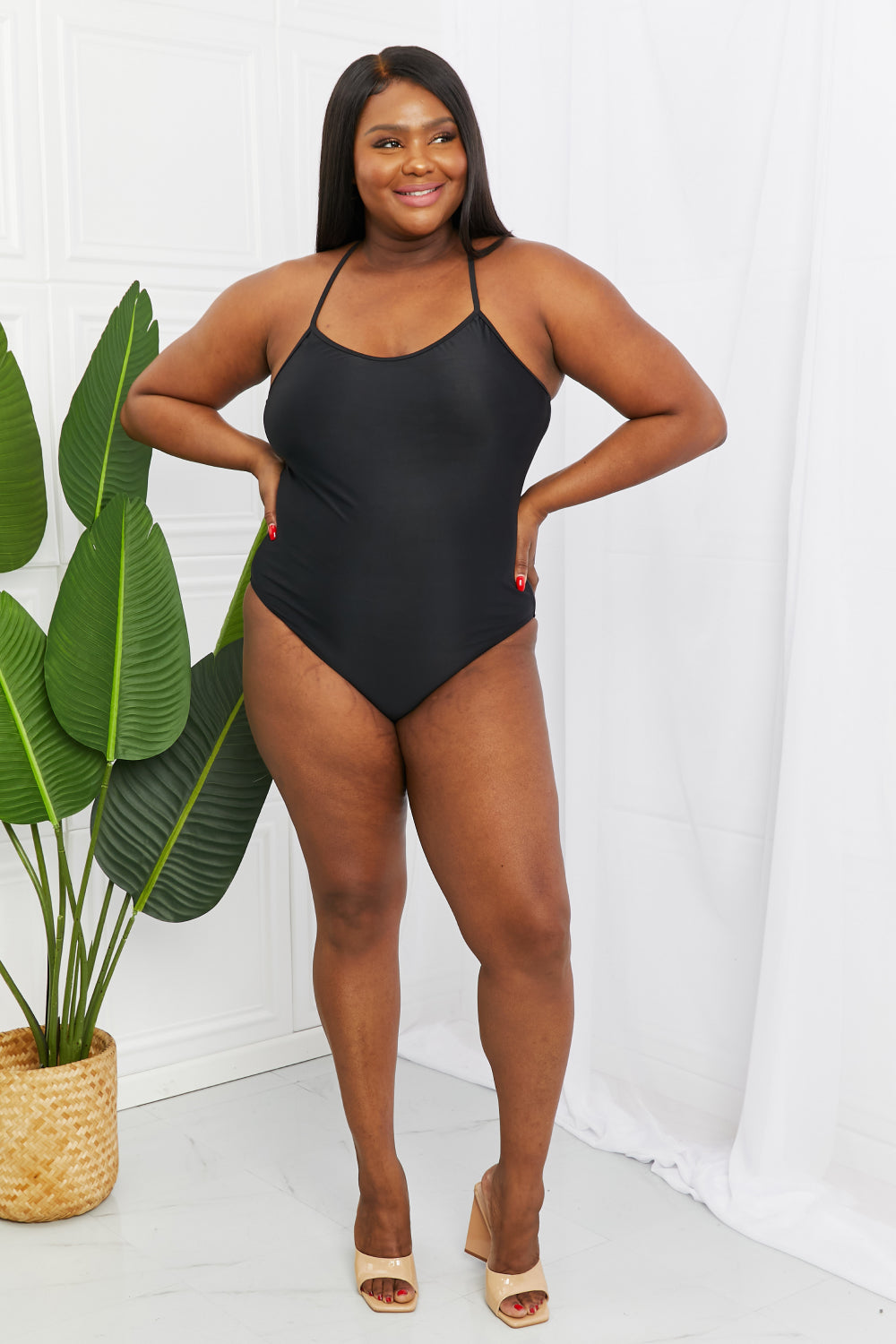 Marina West Swim „High Tide“ Einteiler in Schwarz