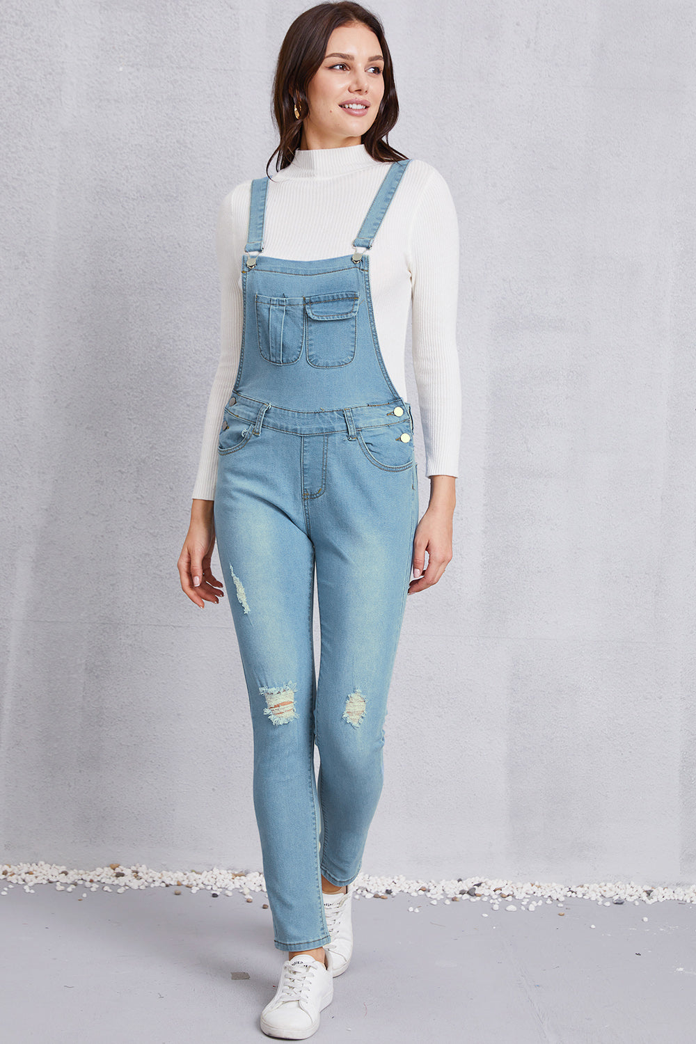 Overall aus gewaschenem Denim im Used-Look mit Taschen