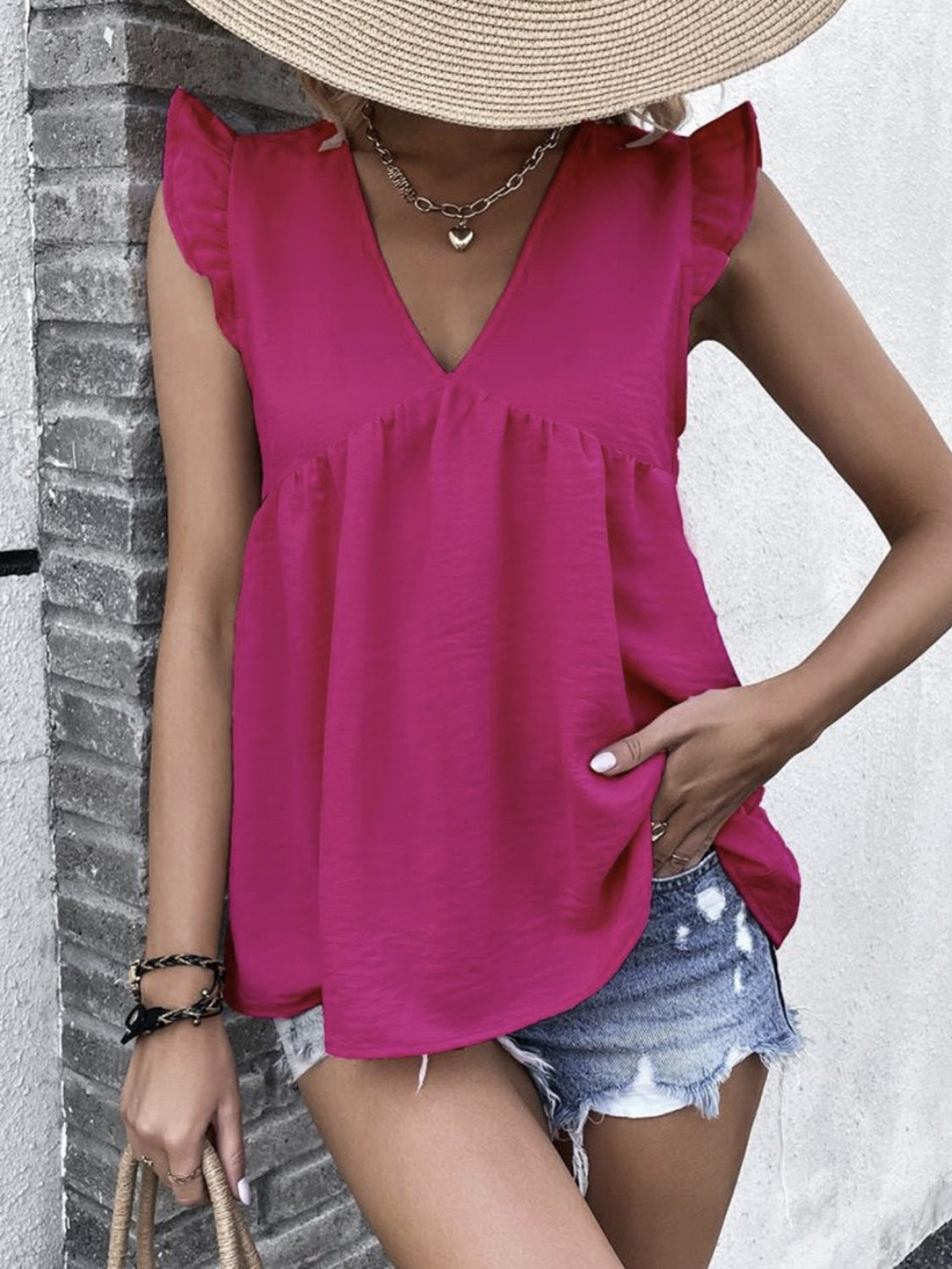 Blusa con mangas casquillo y cuello en V con volantes