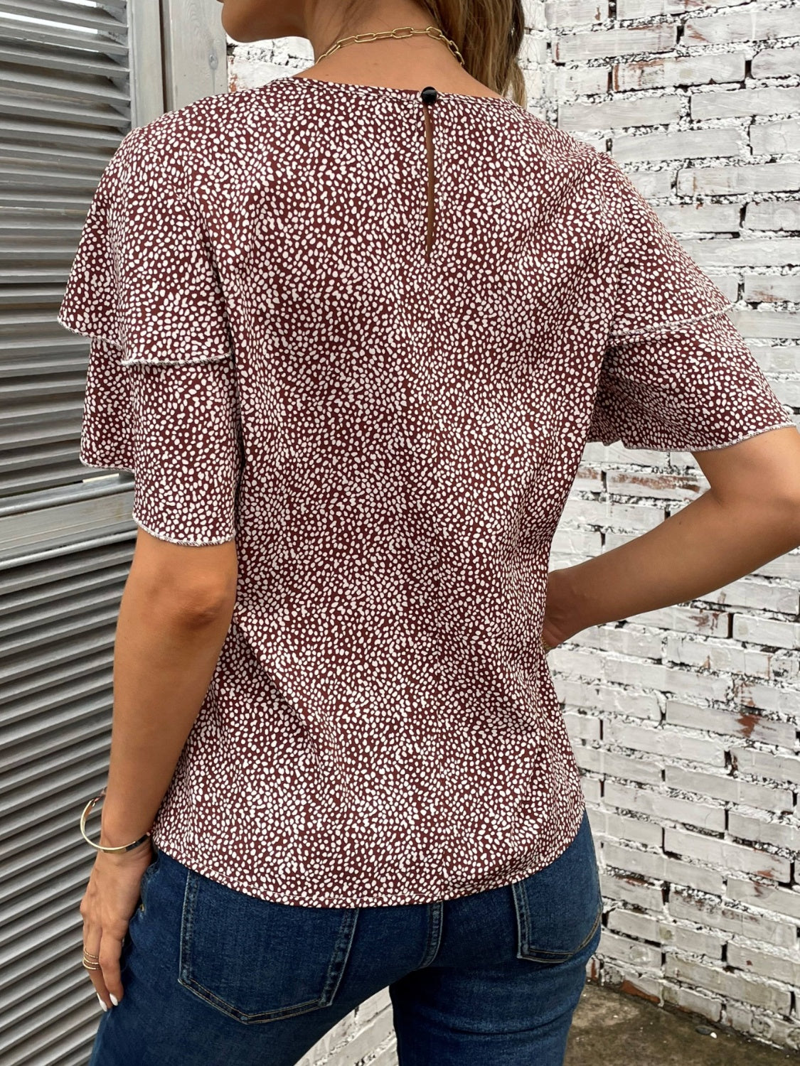 Blusa estampada de manga corta con cuello redondo