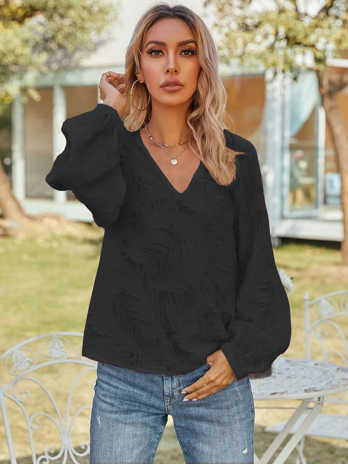 Blusa de manga larga con cuello en V