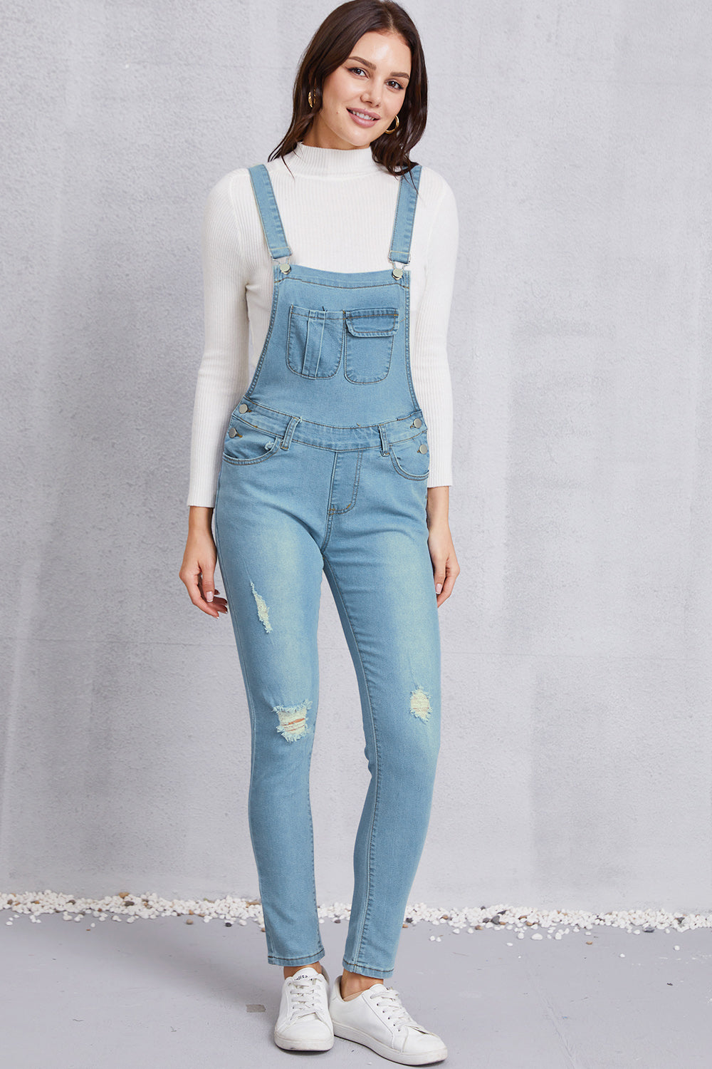 Overall aus gewaschenem Denim im Used-Look mit Taschen