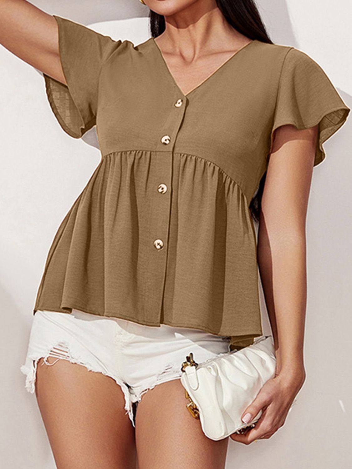 Blusa con mangas acampanadas y cuello en V