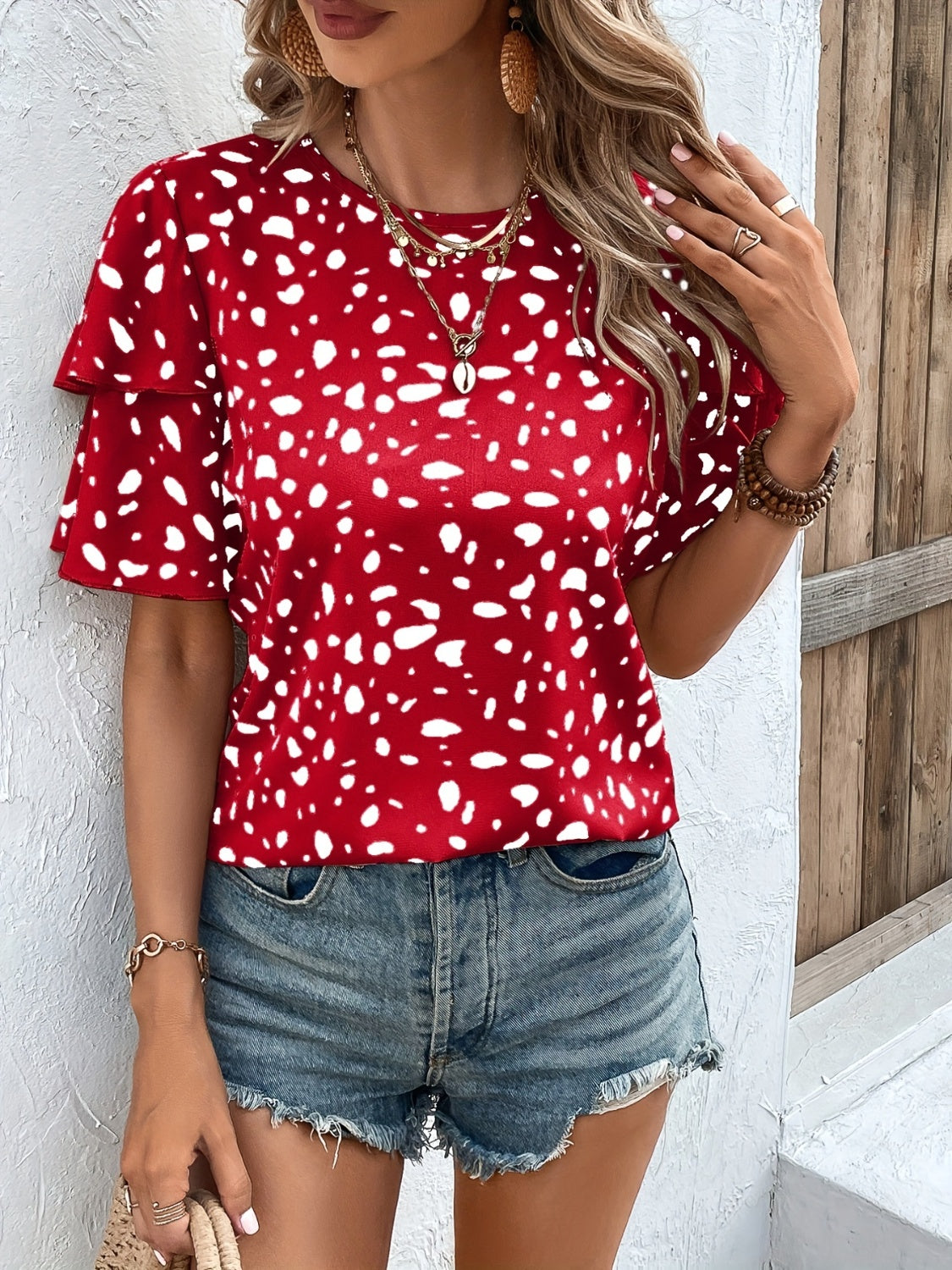 Blusa estampada de manga corta con cuello redondo