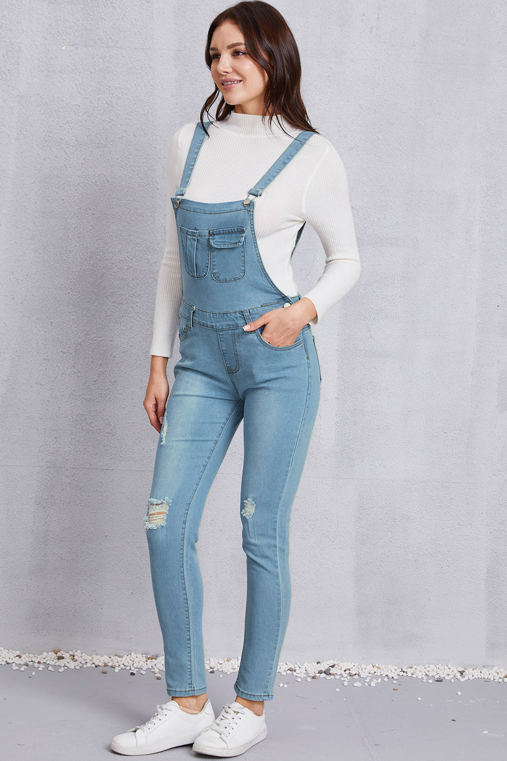 Overall aus gewaschenem Denim im Used-Look mit Taschen