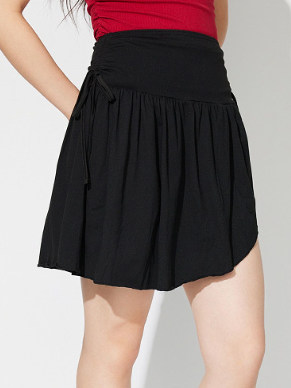 Side Tie Asymmetric Hem Mini Skirt