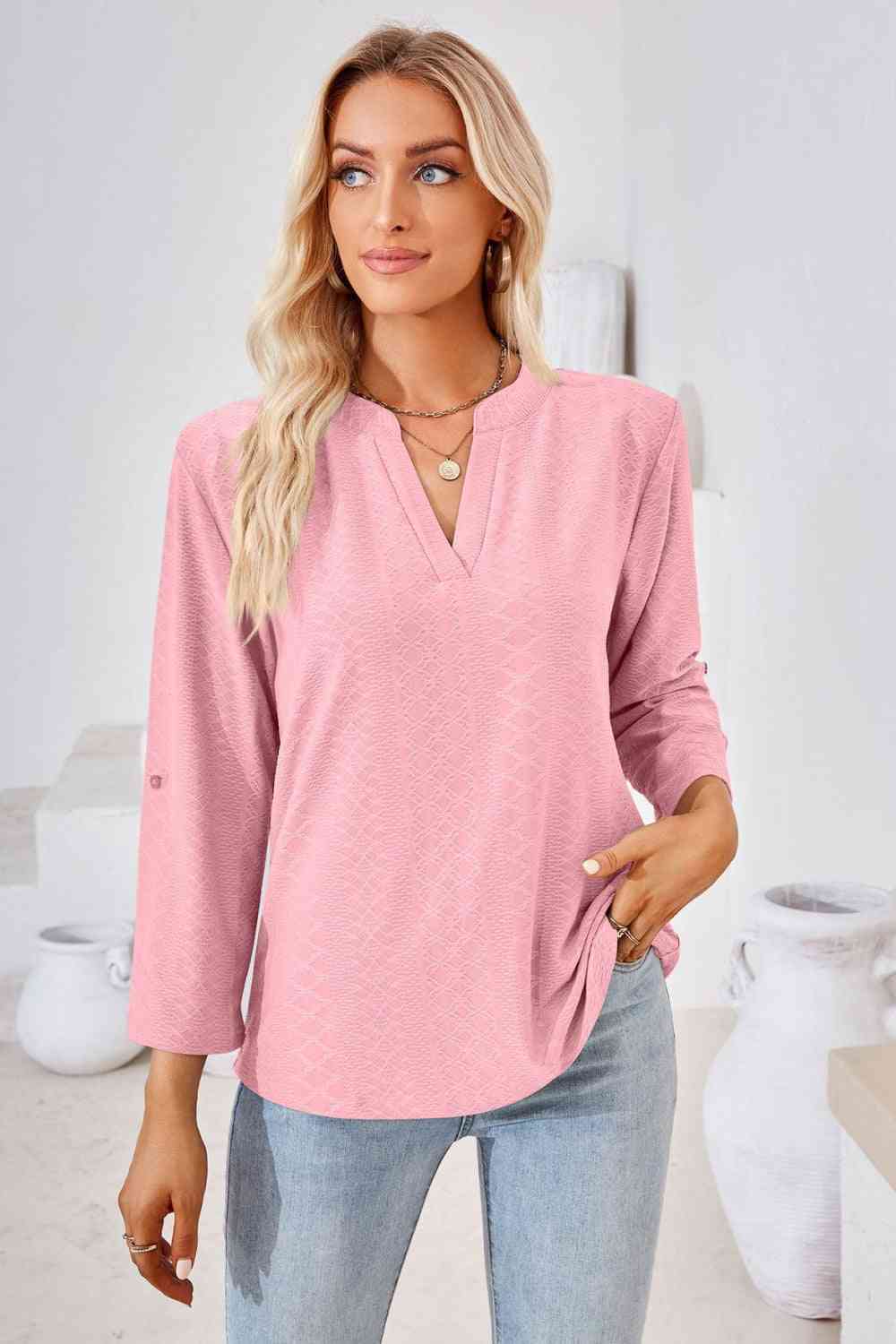 Bluse mit V-Ausschnitt und Rollärmeln