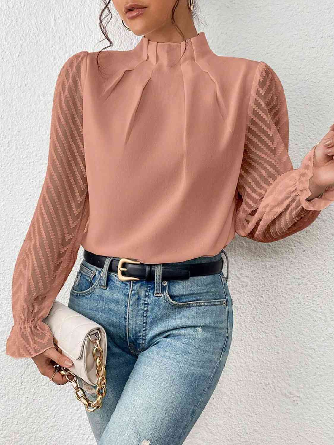 Bluse mit Rollkragen und Volantärmeln