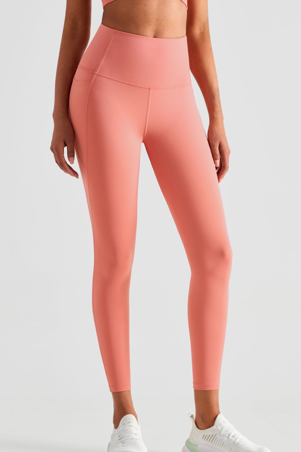 Sportleggings mit breitem Bund und Taschen