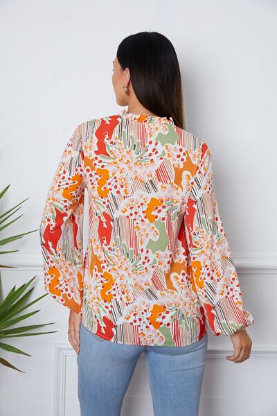 Langärmlige Bluse mit Blumenmuster und Rüschen