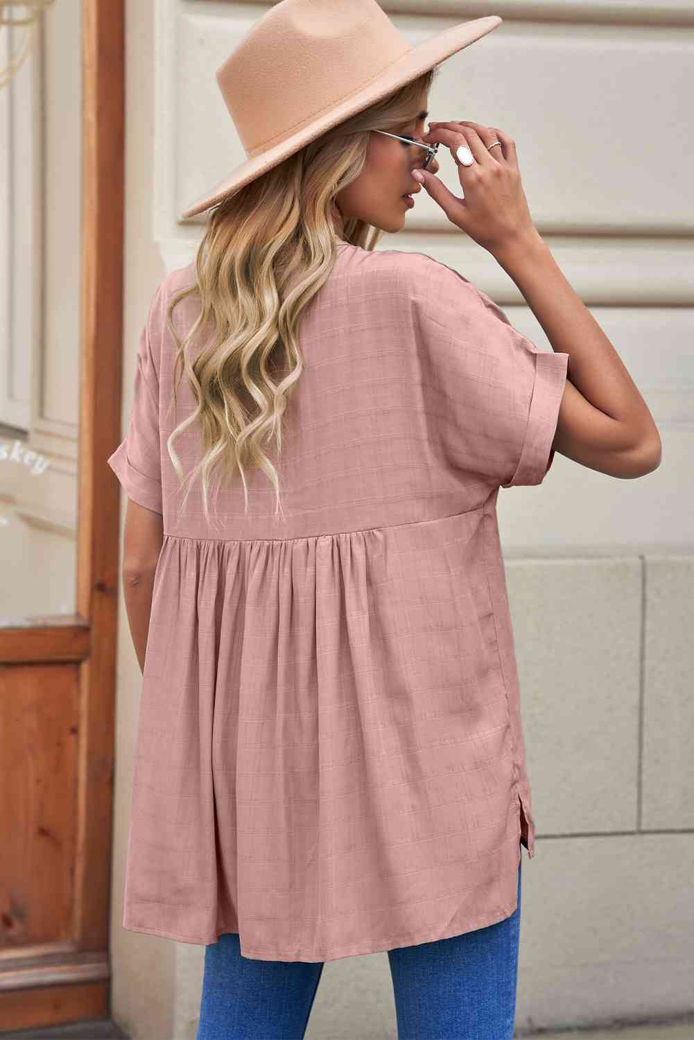 Bluse mit seitlichem Schlitz und Manschetten