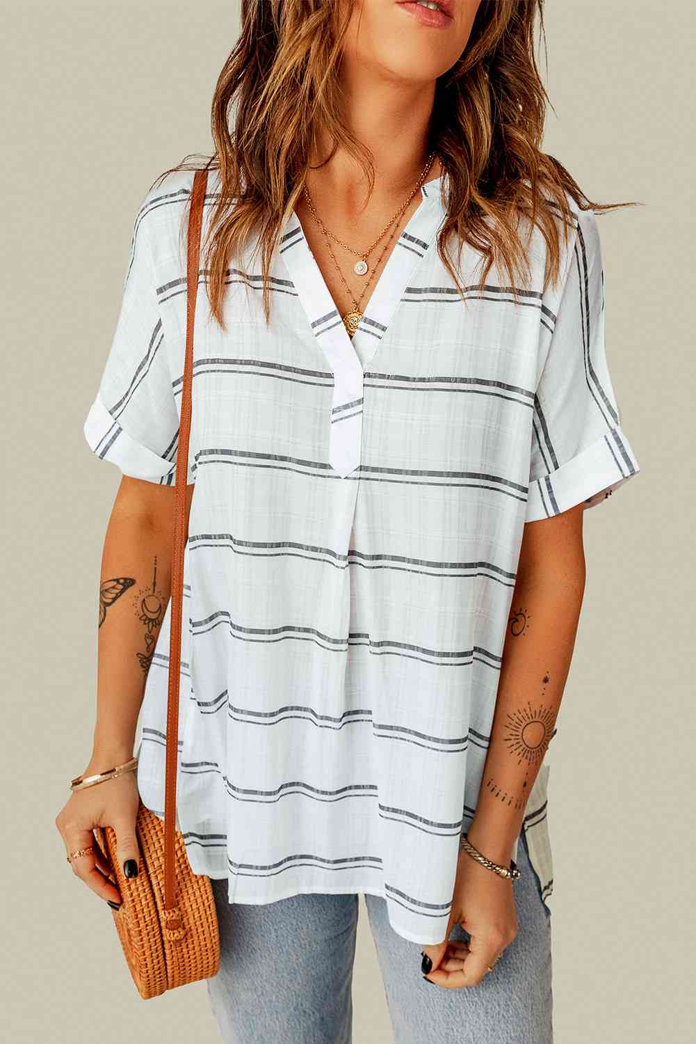 Bluse mit seitlichem Schlitz und Manschetten