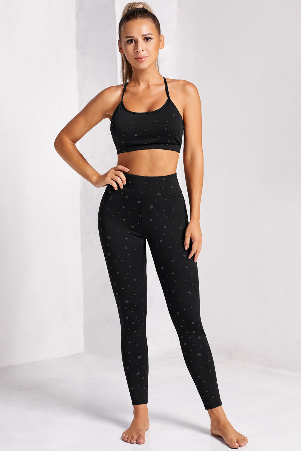 Conjunto de leggings y sujetador deportivo con estampado de estrellas