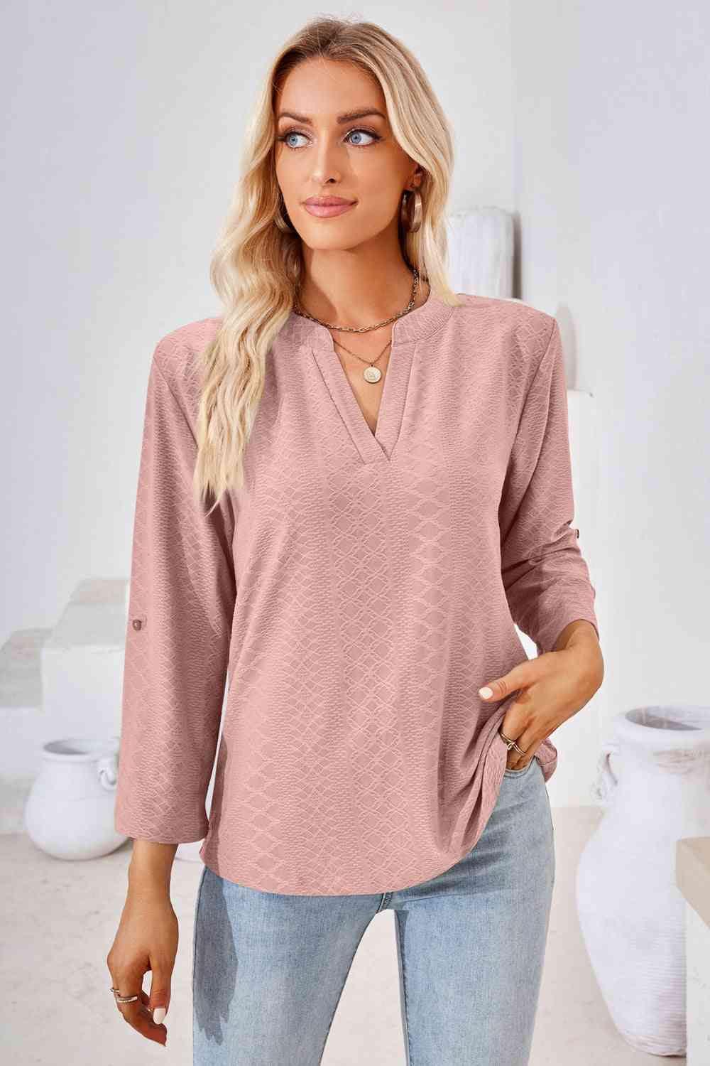 Bluse mit V-Ausschnitt und Rollärmeln