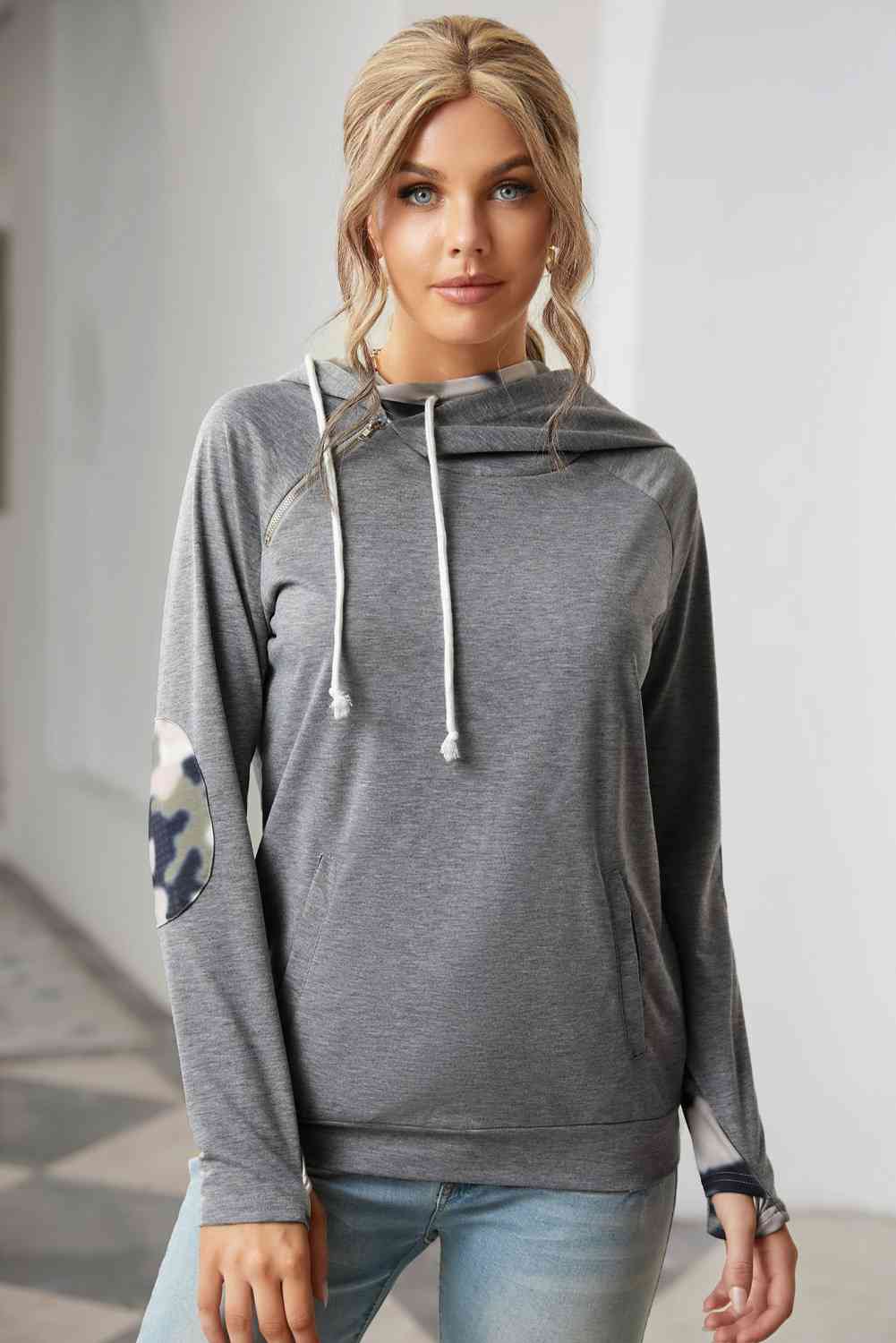 Sweatshirt mit seitlichem Reißverschluss und Fronttasche