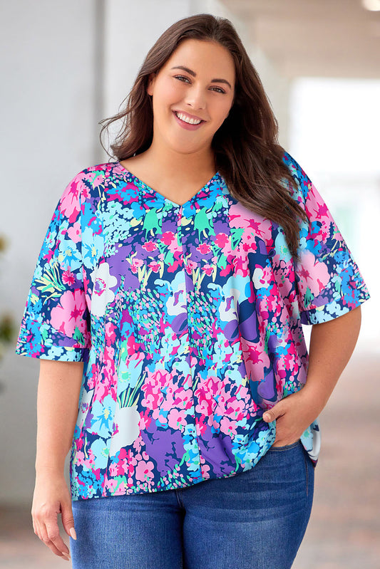 Bluse mit V-Ausschnitt und Blumenmuster in der Mittelnaht