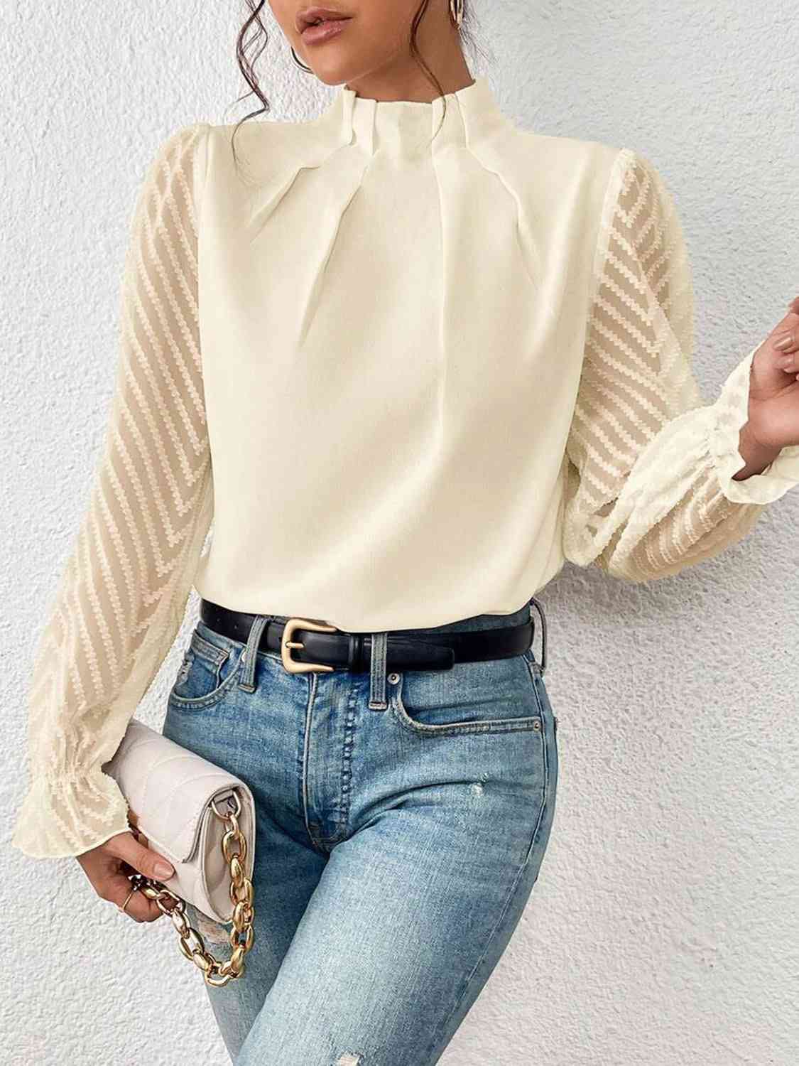 Bluse mit Rollkragen und Volantärmeln