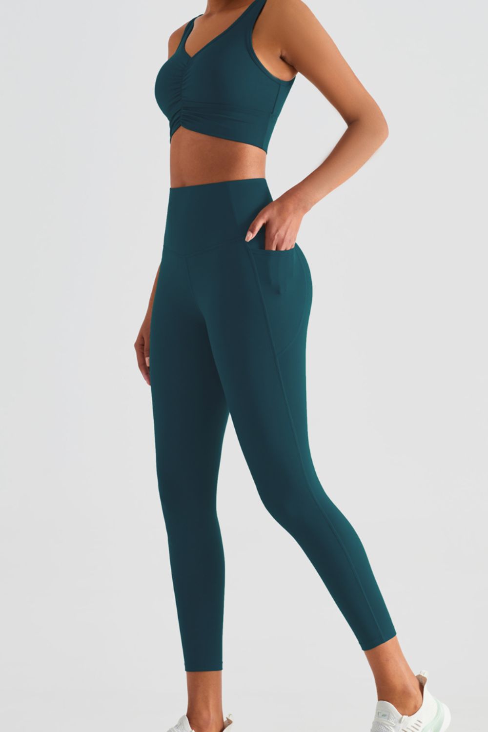 Sportleggings mit breitem Bund und Taschen