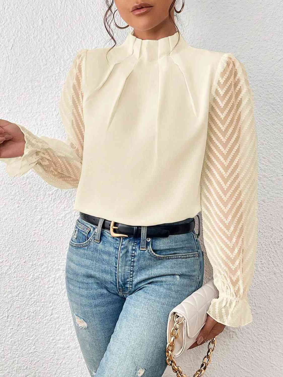 Bluse mit Rollkragen und Volantärmeln