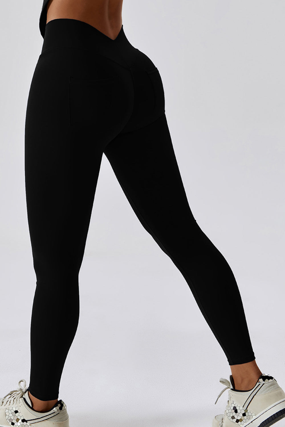 Sport-Leggings mit schmaler Passform und breiter Taillentasche auf der Rückseite