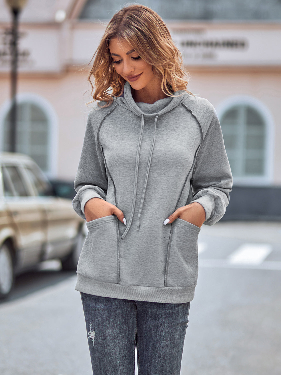 Sweatshirt mit Kordelzug und Taschen