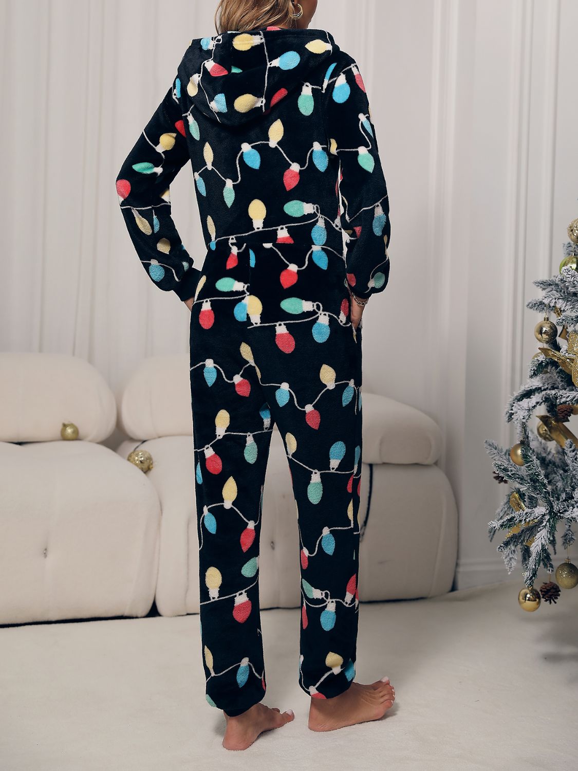 Lounge-Jumpsuit mit Reißverschluss vorne, Kapuze und Taschen