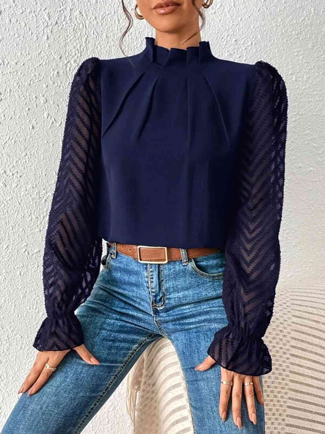 Bluse mit Rollkragen und Volantärmeln