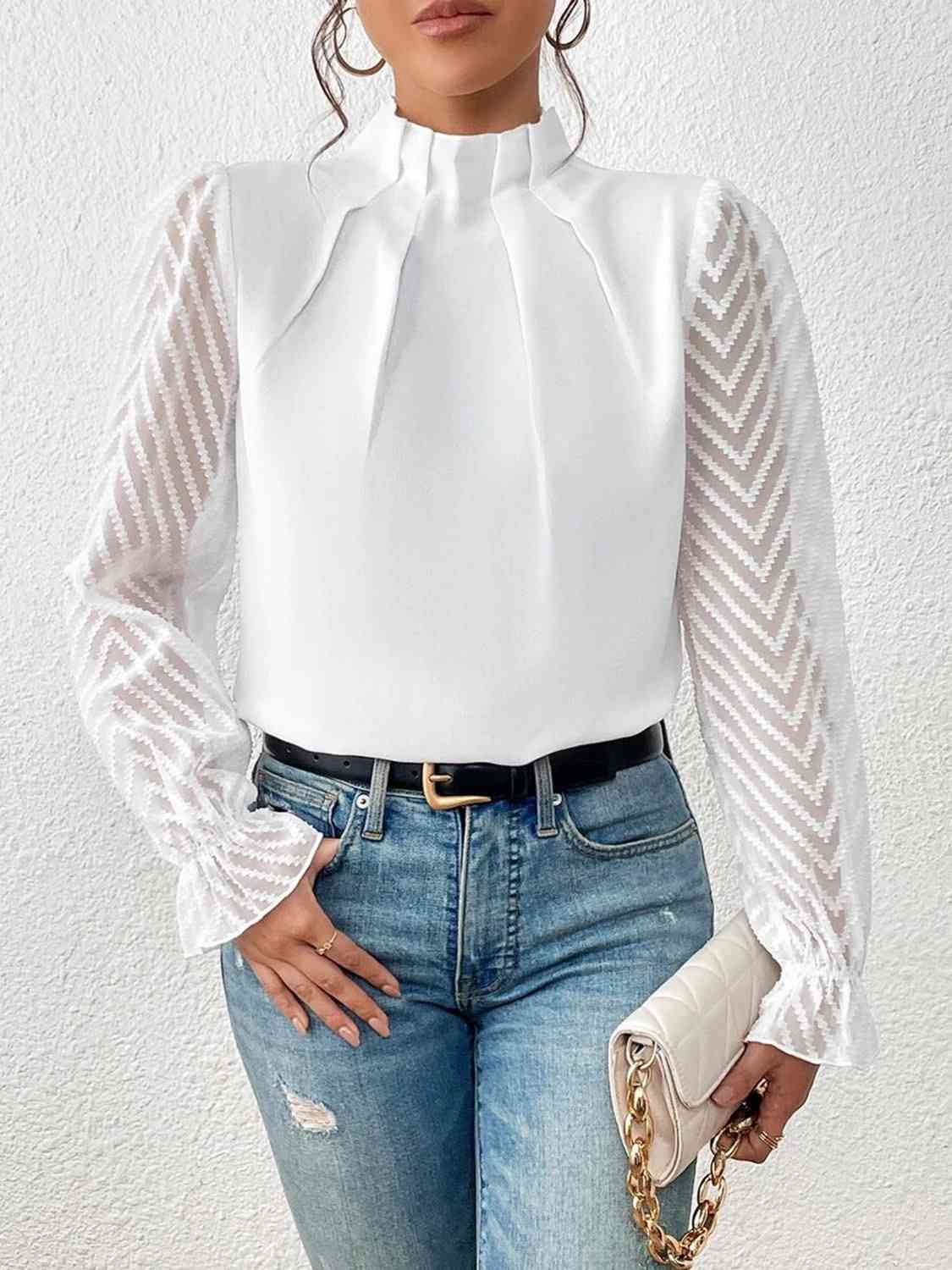 Bluse mit Rollkragen und Volantärmeln