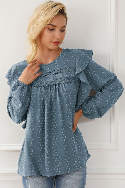 Bluse mit Rundhalsausschnitt und Rüschen