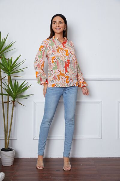 Langärmlige Bluse mit Blumenmuster und Rüschen