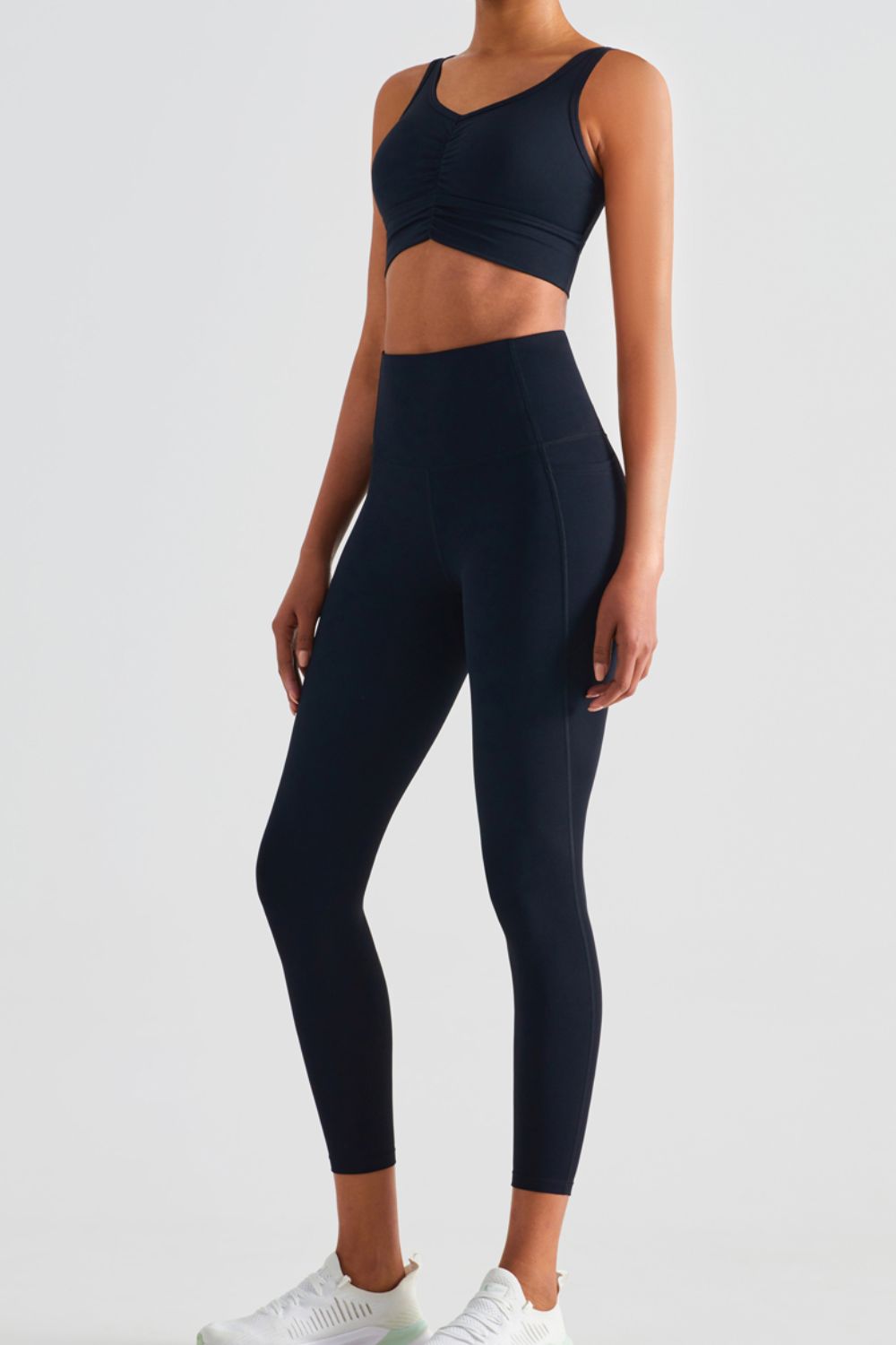 Sportleggings mit breitem Bund und Taschen